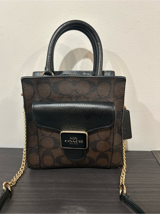 Coach Handbags - Coach Mini Pepper Crossbody in Signature Canvas with a black pebbled leather